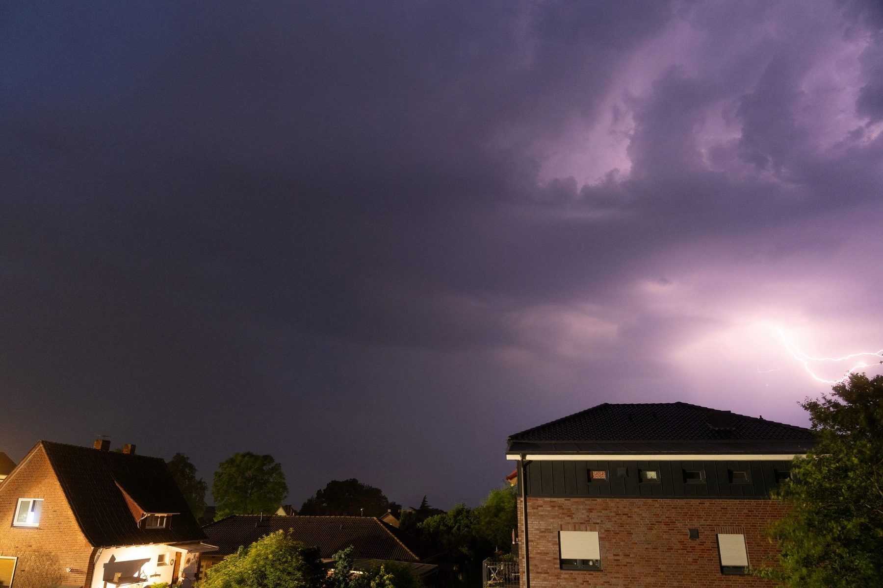 Storm clouds over a Watertown roof